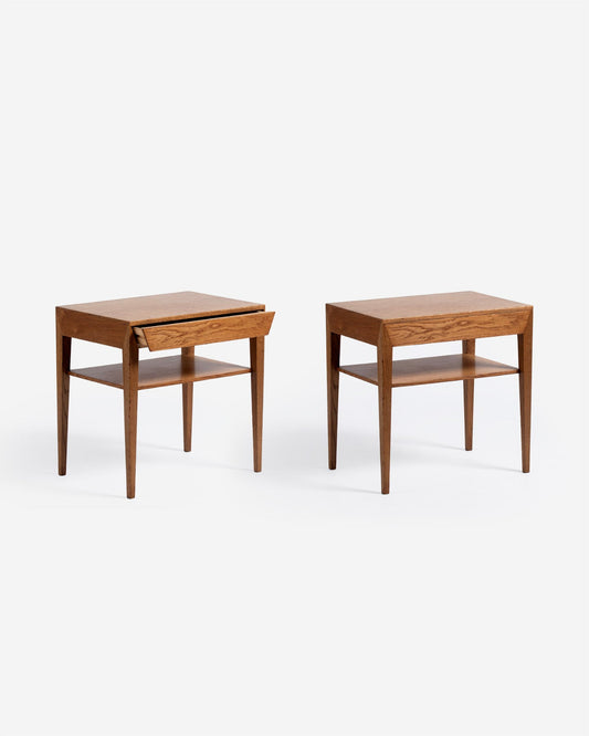 Two wooden side tables on a white background