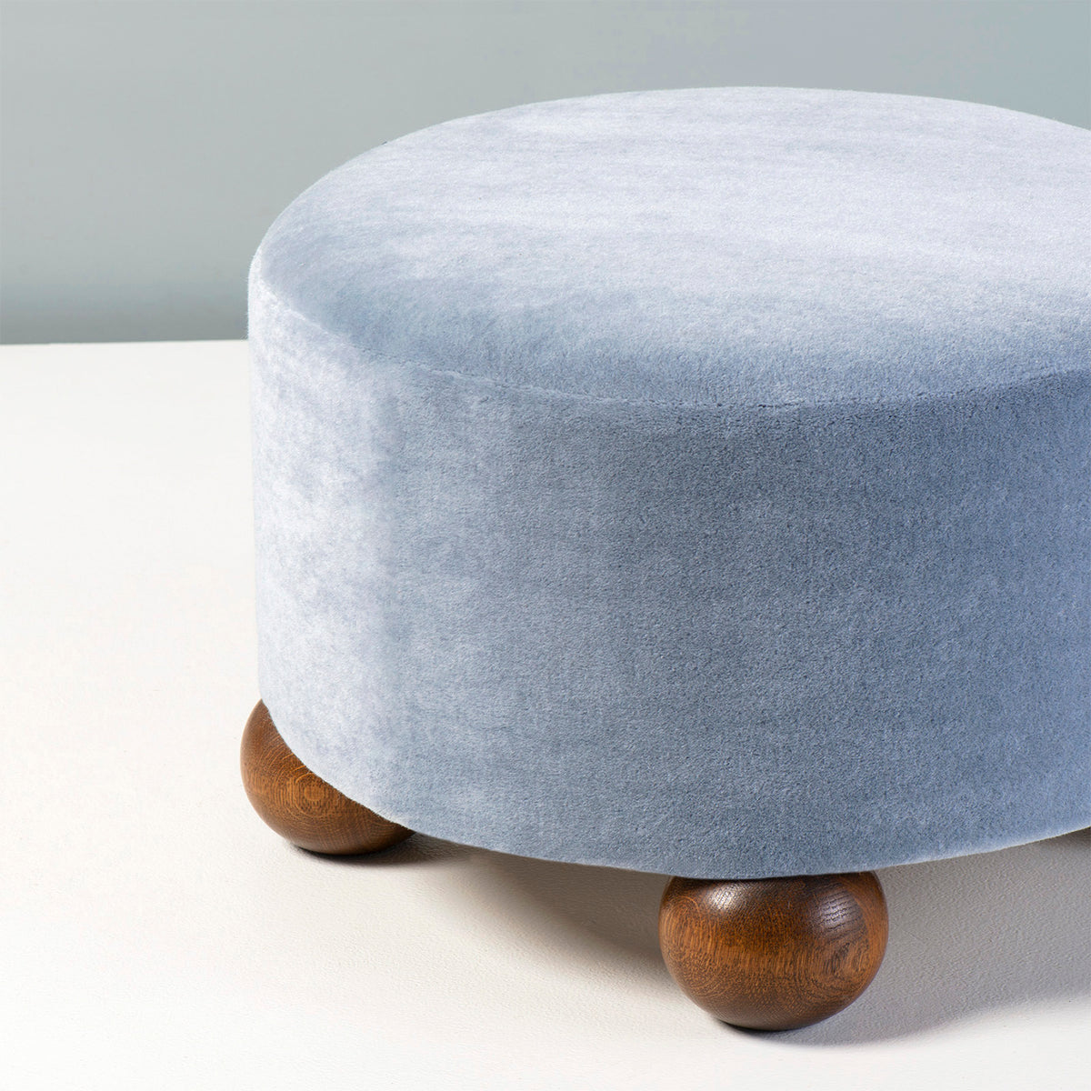 Close-up of soft Sky blue mohair velvet on the Luupo ottoman
